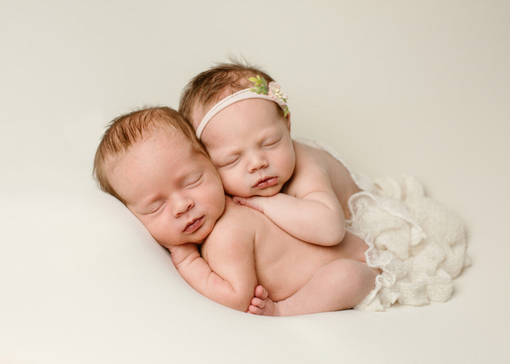 posed photo of newborn twins